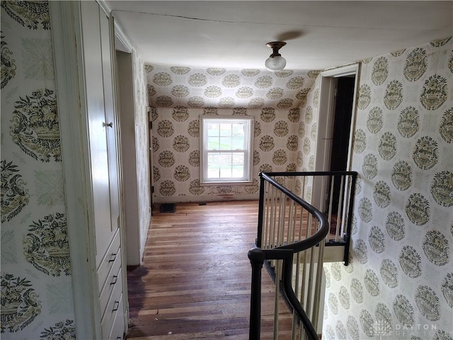 465 W Staunton Rd, Troy, OH 45373 - hallway featuring an upstairs landing, wood finished floors, and wallpapered walls