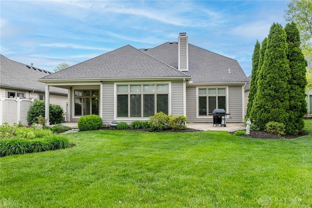 1154 Club View Dr, Centerville, OH 45458 - rear view of property with a patio, a chimney, and roof with shingles
