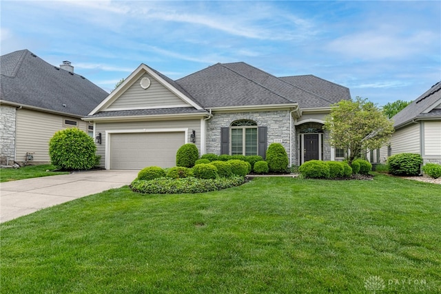 1154 Club View Dr, Centerville, OH 45458 - view of front facade featuring stone siding, driveway, an attached garage, a front lawn, and a shingled roof