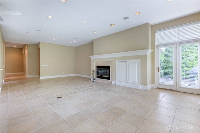 1154 Club View Dr, Centerville, OH 45458 - unfurnished living room featuring light tile patterned floors, recessed lighting, a tile fireplace, and baseboards