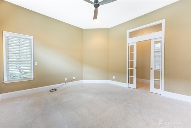 1154 Club View Dr, Centerville, OH 45458 - carpeted spare room with french doors, a ceiling fan, and baseboards