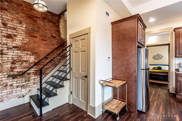 320 N Mechanic St, Lebanon, OH 45036 - stairs with wood finished floors and brick wall