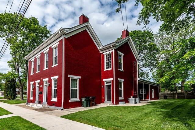 320 N Mechanic St, Lebanon, OH 45036 - view of front of property with a chimney and brick siding