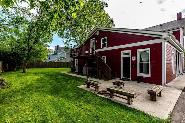 320 N Mechanic St, Lebanon, OH 45036 - rear view of house featuring an outdoor fire pit, a patio area, and stairs