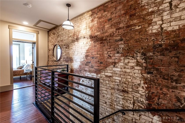 320 N Mechanic St, Lebanon, OH 45036 - hall featuring an upstairs landing, wood-type flooring, and brick wall