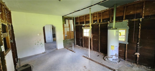 basement featuring gas water heater