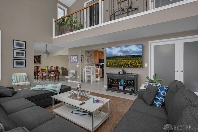 1395 Chickasaw Dr, London, OH 43140 - tiled living area with a high ceiling and french doors