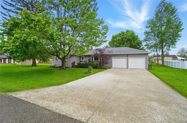 56 W Xenia St, Jamestown Vlg, OH 45335 - view of front of property with a garage, driveway, and a chimney