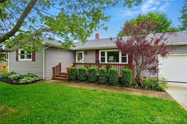 56 W Xenia St, Jamestown Vlg, OH 45335 - ranch-style house featuring an attached garage, a front lawn, a chimney, driveway, and a deck