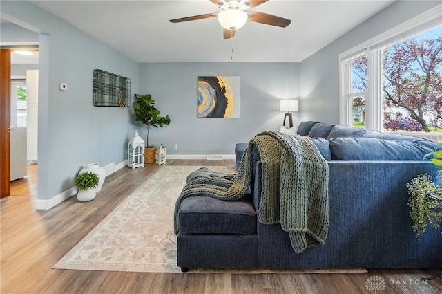 56 W Xenia St, Jamestown Vlg, OH 45335 - living area with a ceiling fan, wood finished floors, and baseboards