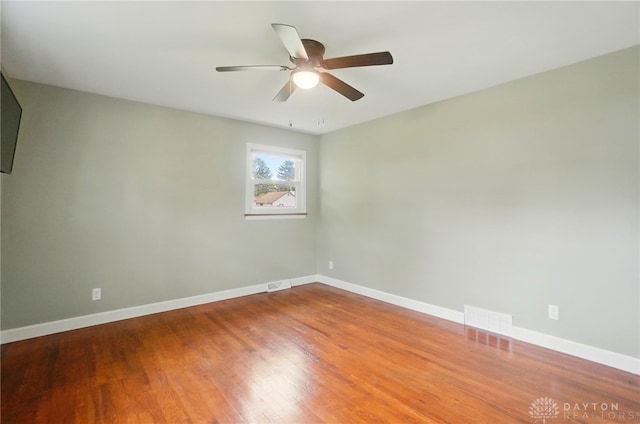 56 W Xenia St, Jamestown Vlg, OH 45335 - empty room with ceiling fan, wood finished floors, and baseboards