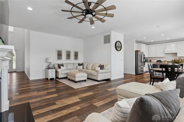 4061 Woodland Ridge Ct, Bellbrook, OH 45440 - living area featuring a ceiling fan, dark wood-type flooring, recessed lighting, baseboards, and a fireplace