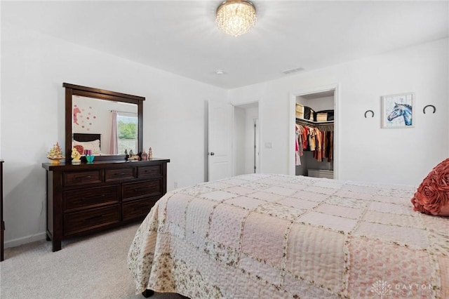 4061 Woodland Ridge Ct, Bellbrook, OH 45440 - bedroom featuring light carpet, baseboards, and a spacious closet