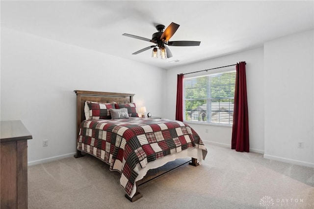 4061 Woodland Ridge Ct, Bellbrook, OH 45440 - bedroom with carpet flooring, baseboards, and a ceiling fan