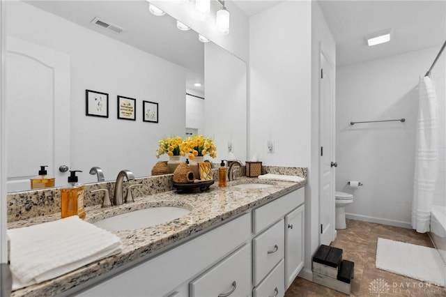 4061 Woodland Ridge Ct, Bellbrook, OH 45440 - bathroom with toilet, double vanity, shower / bath combo, and baseboards