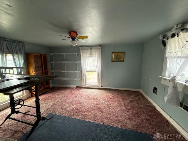 318 E Main St, Bradford, OH 45308 - unfurnished office featuring carpet floors, a ceiling fan, and baseboards