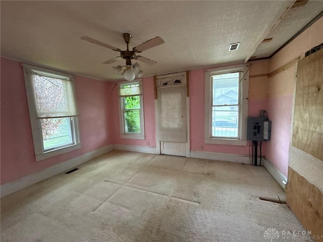 318 E Main St, Bradford, OH 45308 - spare room with ceiling fan, baseboards, and light colored carpet