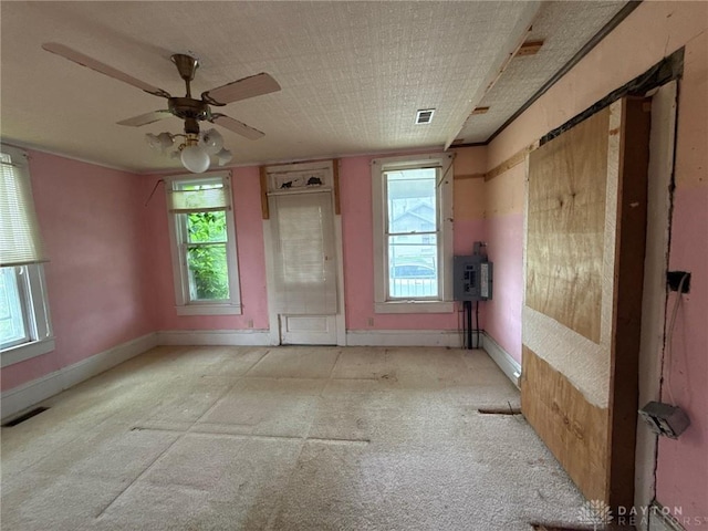 318 E Main St, Bradford, OH 45308 - spare room with light carpet, baseboards, and ceiling fan