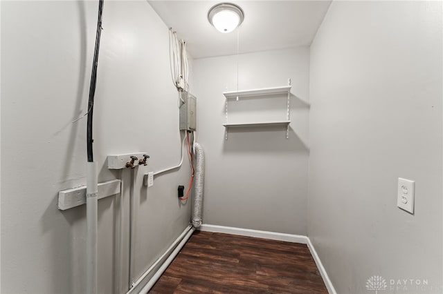 walk in closet featuring dark wood-style flooring