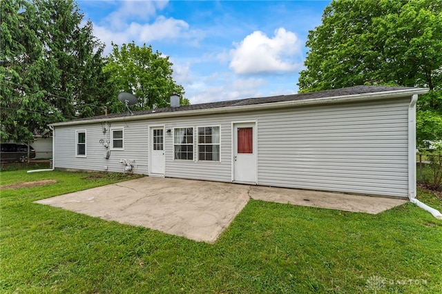 rear view of property featuring a patio