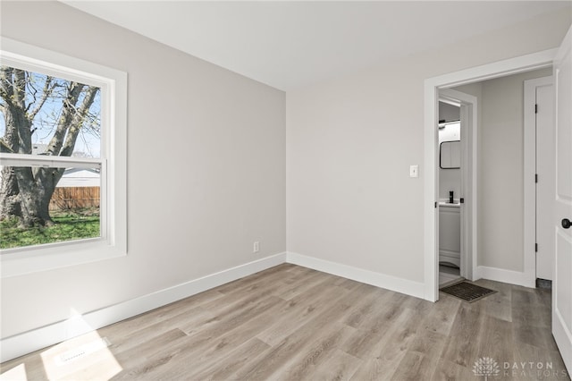 235 N Delmar Ave, Dayton, OH 45403 - unfurnished room featuring light wood-style floors and baseboards