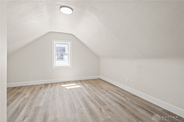 235 N Delmar Ave, Dayton, OH 45403 - bonus room with vaulted ceiling, wood finished floors, and baseboards