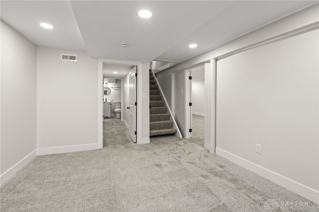 235 N Delmar Ave, Dayton, OH 45403 - finished below grade area with recessed lighting, carpet floors, stairs, and baseboards