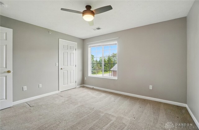 3128 Alexander Pl Unit 206, Beavercreek, OH 45431 - unfurnished bedroom featuring baseboards, carpet floors, and a ceiling fan