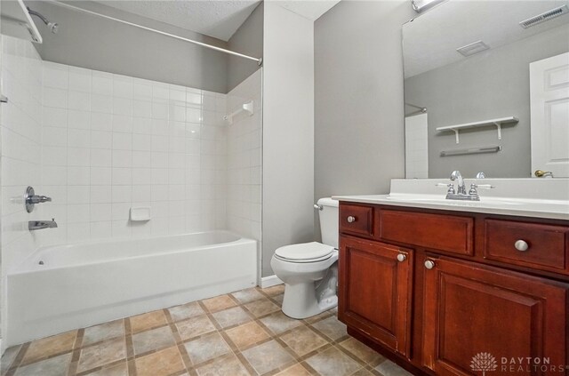 3128 Alexander Pl Unit 206, Beavercreek, OH 45431 - bathroom featuring toilet, tub / shower combination, and vanity