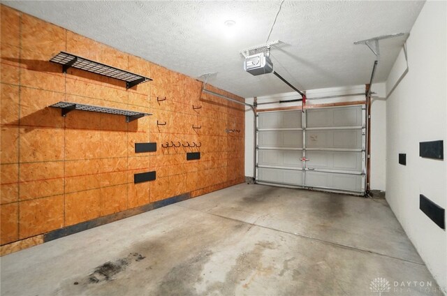 3128 Alexander Pl Unit 206, Beavercreek, OH 45431 - garage featuring a garage door opener