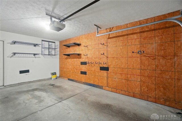 3128 Alexander Pl Unit 206, Beavercreek, OH 45431 - garage featuring a garage door opener