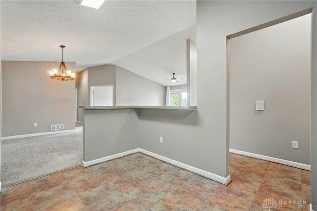 3128 Alexander Pl Unit 206, Beavercreek, OH 45431 - spare room featuring a ceiling fan, vaulted ceiling, a chandelier, and baseboards