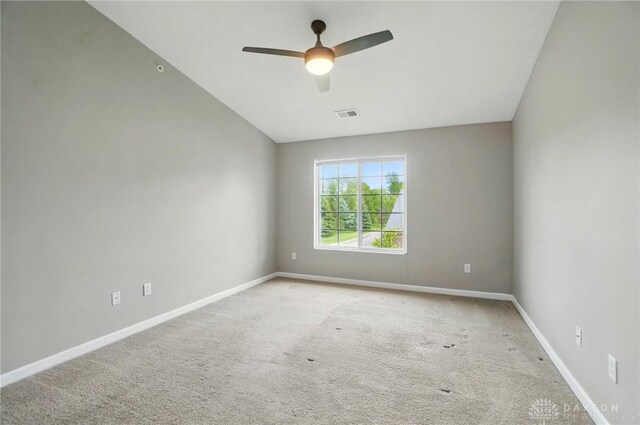 3128 Alexander Pl Unit 206, Beavercreek, OH 45431 - empty room with light colored carpet, ceiling fan, baseboards, and vaulted ceiling