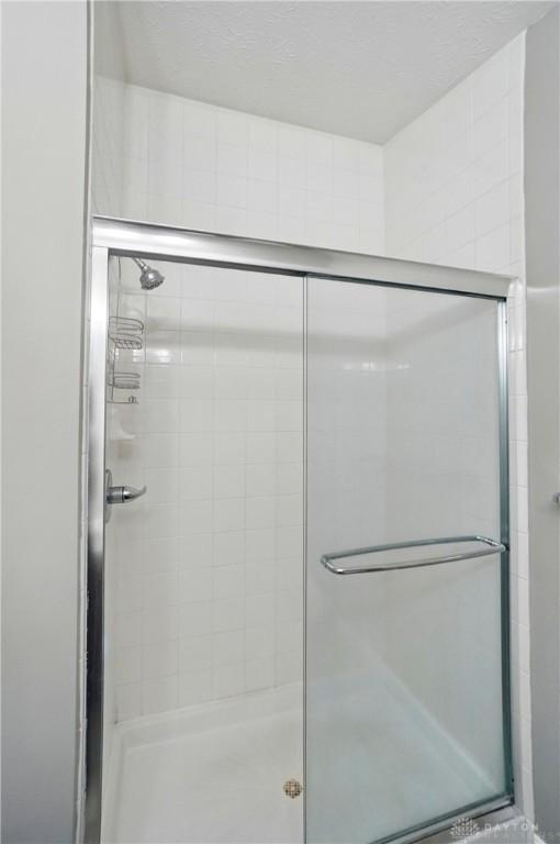 3128 Alexander Pl Unit 206, Beavercreek, OH 45431 - full bathroom featuring a stall shower