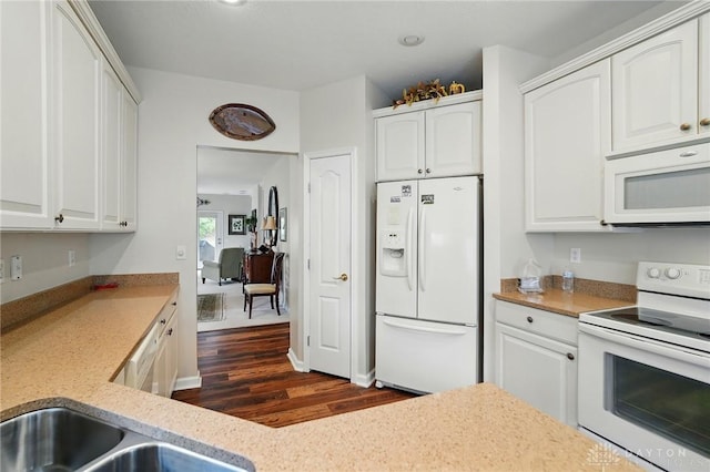 1152 Meadow Vista Dr, Maineville, OH 45039 - kitchen featuring white appliances, dark wood-style floors, and white cabinets