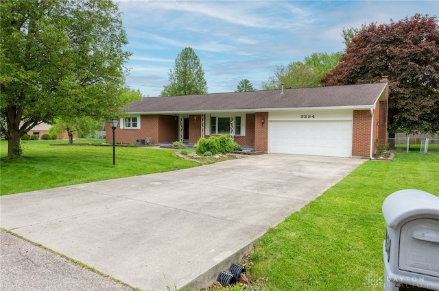 ranch-style house featuring an attached garage, brick siding, and concrete driveway