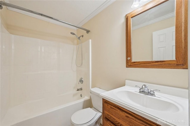 bathroom featuring crown molding, toilet, vanity, and tub / shower combination