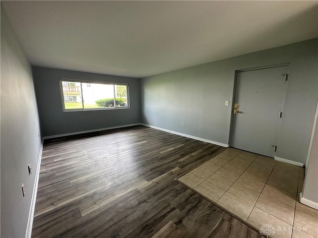 5700 Coach Dr Unit B, Kettering, OH 45440 - spare room with wood finished floors and baseboards