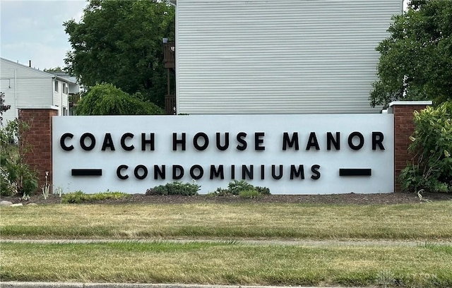5700 Coach Dr Unit B, Kettering, OH 45440 - community sign featuring a lawn