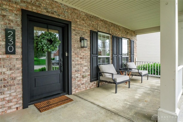 230 Stanton Dr, Springboro, OH 45066 - property entrance featuring covered porch and brick siding