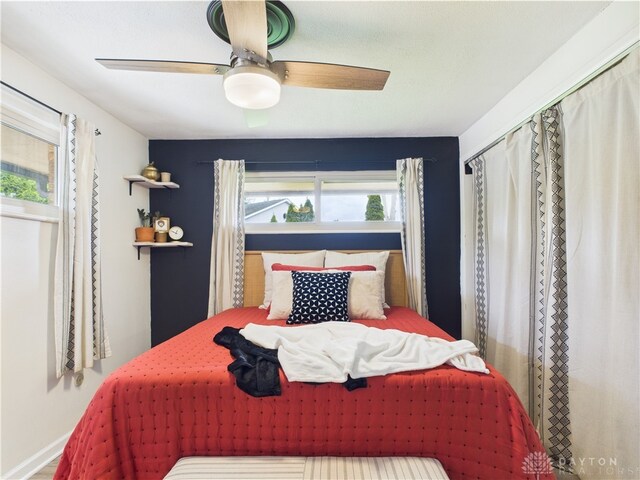 9094 Mary Haynes Dr, Washington Twp, OH 45458 - bedroom with multiple windows and ceiling fan