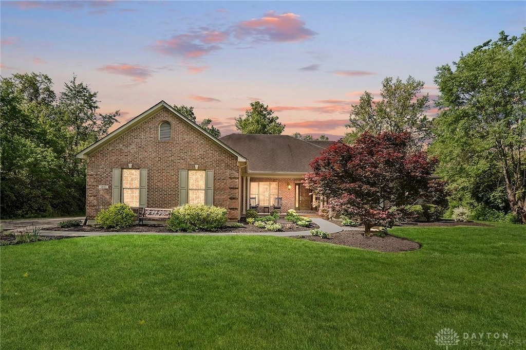 1885 Greentree Rd, Lebanon, OH 45036 - view of front of house with brick siding and a front lawn