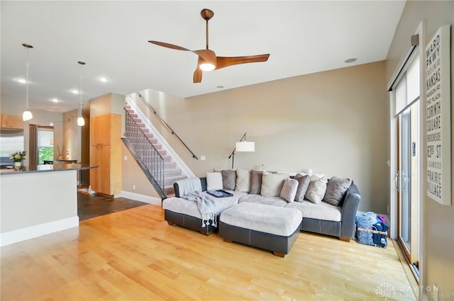 2731 Cleinview Ave Unit 2, Cincinnati, OH 45206 - living room with stairway, wood finished floors, ceiling fan, baseboards, and recessed lighting