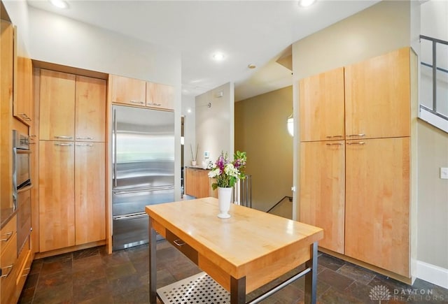 2731 Cleinview Ave Unit 2, Cincinnati, OH 45206 - kitchen featuring appliances with stainless steel finishes, dark stone finish floors, recessed lighting, and baseboards