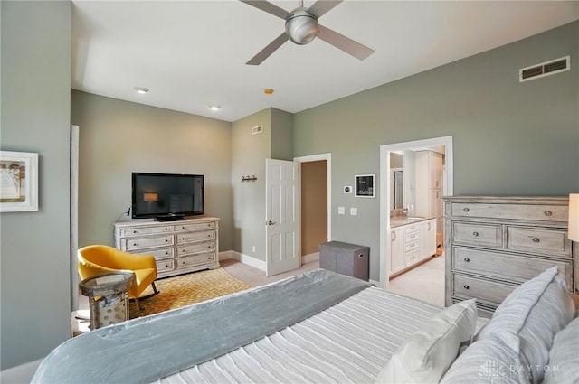 2731 Cleinview Ave Unit 2, Cincinnati, OH 45206 - bedroom with baseboards, light colored carpet, ensuite bath, and a ceiling fan