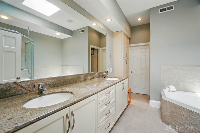 2731 Cleinview Ave Unit 2, Cincinnati, OH 45206 - full bathroom with a stall shower, tile patterned floors, a bath, double vanity, and recessed lighting