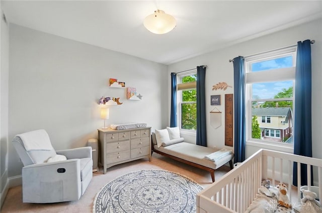 2731 Cleinview Ave Unit 2, Cincinnati, OH 45206 - bedroom featuring a crib and light colored carpet