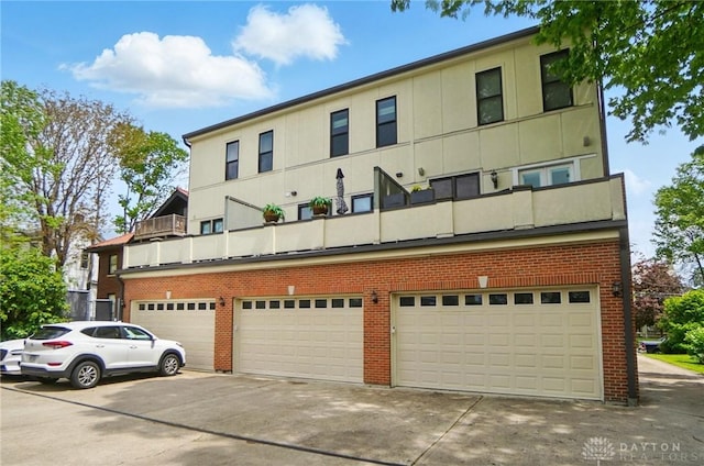 2731 Cleinview Ave Unit 2, Cincinnati, OH 45206 - view of property featuring concrete driveway and an attached garage