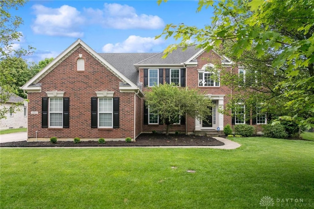 1082 Kenworthy Pl, Centerville, OH 45458 - colonial inspired home featuring a front yard and brick siding