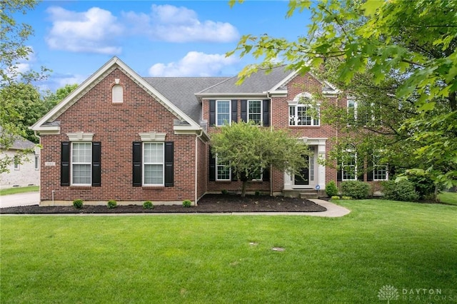 1082 Kenworthy Pl, Centerville, OH 45458 - colonial inspired home featuring a front yard and brick siding